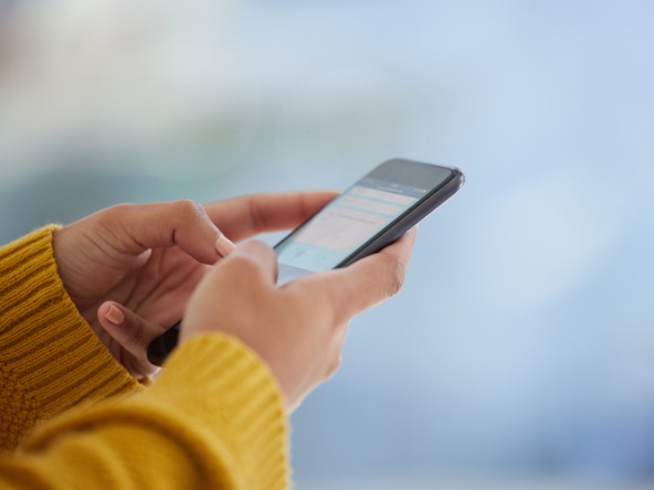 person typing on smartphone 